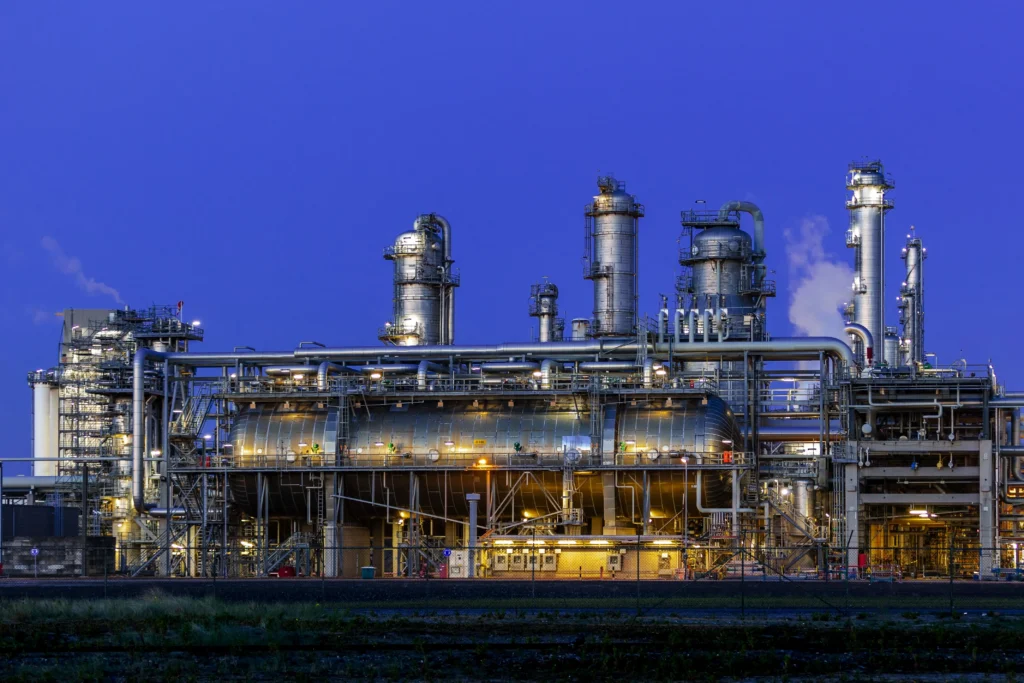 Modern oil and gas processing facility with industrial process equipment